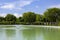 Pond in a park view. A fountain of a pond in a park.