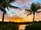 Pond sunset Bonita Springs Florida Palm trees ï¿¼