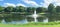 Pond with water fountain in small American neighborhood