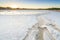 Ponds full of salt after evaporation of ocean water at salines in Faro, Portugal