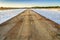 Ponds full of salt after evaporation of ocean water at salines in Faro, Portugal