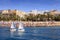 Poniente beach in Benidorm with two boats sailing to the bay