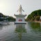 Ponorogo 12 September 2023 From a distance there is a statue of a white woman in the middle of a pond in Ponorogo city park