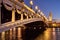 Pont Alexandre III bridge and Seine River at sunset. Paris, France