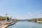 Pont de l`Universite bridge in Lyon, France over a panorama of the riverbank of the Rhone river Quais de Rhone