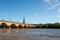 Pont de Pierre and church Saint Michel in Bordeaux town France