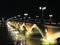 Pont de pierre old stony bridge at night in Bordeaux