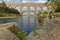 The Pont du Gard over the rocks and the river