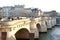 The Pont Neuf  is the oldest standing bridge across the river Seine in Paris, France