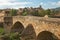 Pont Vell The Old Bridge and the fortress of Montblanc town, Spain