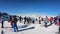 Ponte di Legno, Tonale, Italy. Skiers at the arrival of the Presena cableway get ready for the glacier descent