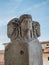 Ponte fabricio warn marble heads statues, Rome Italy