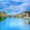 Ponte Vecchio landmark on sunset, old bridge, Arno river in Florence. Tuscany, Italy.