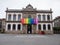 PONTEVEDRA, SPAIN - July 25, 2021: Town hall building decorated with LGBTQIA pride flag colors, Pontevedra,Galicia, Spain