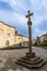 Pontevedra, Spain, September 16, 2023. Plaza Alonso de Fonseca and stone cross in the city of Pontevedra.