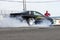 Pontiac drag car making a smoke show