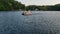 Pontoon boat sailing on a pond