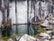 Pool in abandoned old marble quarry. With ripples.