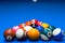 pool balls triangle on billiard table