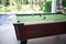 Pool with billiard balls in Home stay