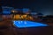 Pool in the courtyard at Villa Maria at night, Chora, Ios, Greece