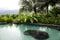 Pool with hot thermal water in a hotel The Springs Resort and Spa