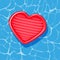 Pool infantable red heart leaf mattress place on water texture.