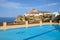 Pool overlooking the Chora on the Island of Folegandros. Greece