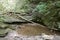 Pool surrounded by large rocks