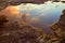 Pool Of Water With Reflection Of Storm Clouds