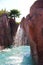 Pool with a waterfall. Decorative stones with a pond