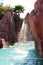 Pool with a waterfall. Decorative stones with a pond