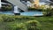 pool, waters gushing from the fountain. green garden and buildings.