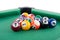 Poolballs on a billiard table