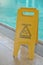 Poolside caution sign