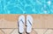 Poolside holiday scenic sandals thongs vacation swimming pool copy space