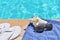 Poolside holiday scenic shell towel thongs sunglasses
