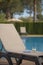 Poolside Lounge Chair With Drink and Tablet