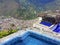 POOLSIDE OVERLOOKING TOWN IN THE VALLEY, BANOS ECUADOR