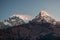 Poonhill view of Annapurnas. Warm pink and orange sunrise light over Annapurna mountain range from Poon hill, Himalayas, Nepal