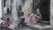 Poor African Family with Mother and Children in Slums of Stone Town, Zanzibar