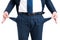 Poor businessman showing empty pants pockets