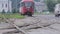 Poor condition of the road surface with tramway rails.