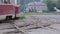 Poor condition of the road surface with tramway rails.