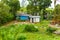 Poor dilapidated houses of the inhabitants of the island of Sri Lanka. Jungle lodging