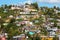 Poor houses on the hills of a small town named Tome in Chile