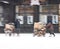 Poor man pulling a cart with cardboard in the city in snowy winter day