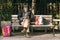 A poor man reads a book on a park bench in Bucharest