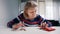 Poor old woman counting coins on the table. Low pension and insufficient funds