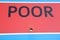 Poor - A sign to be displayed as a billboard or book cover!